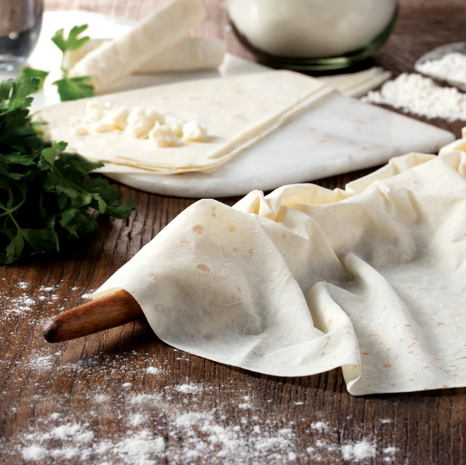 A package of Bower & Yufka Phyllo Dough, 4 sheets per bag, in a clear plastic clamshell container with a white and red label, photographed on a seamless white background.